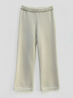 Beige knitted pants with studio lighting