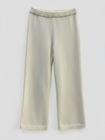 Cleaned beige knitted pants with off-white background