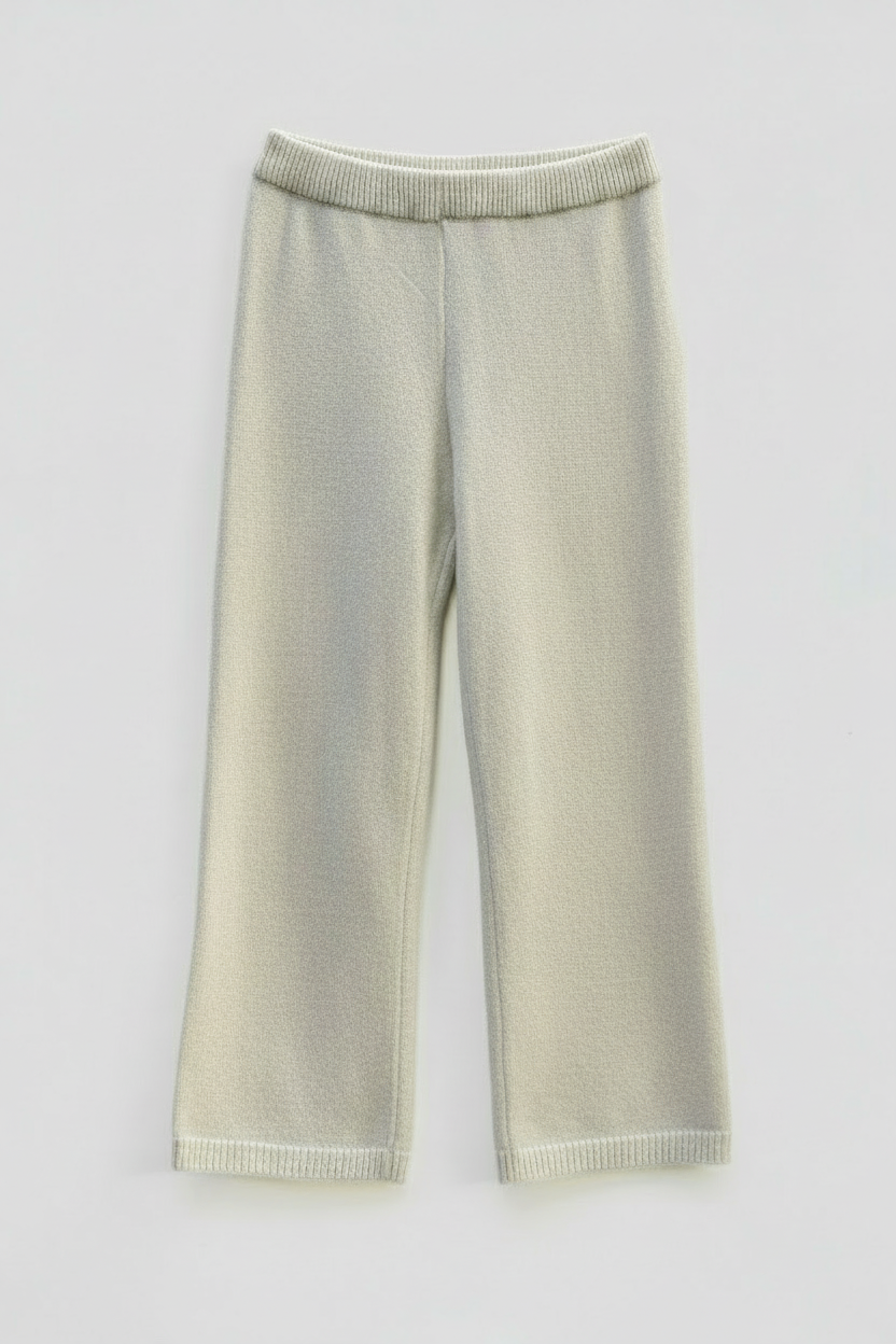 Beige knitted pants with studio lighting