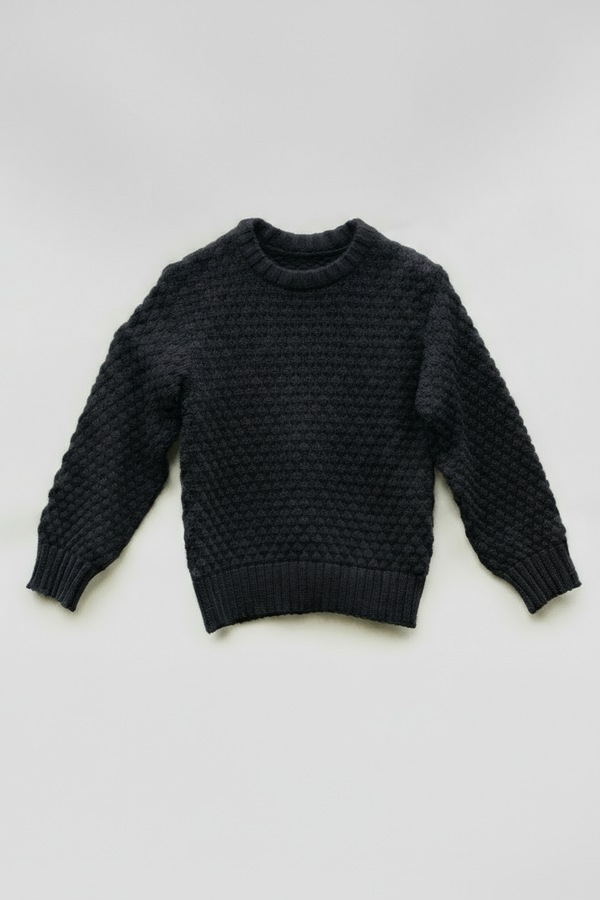 Black sweater with solid background